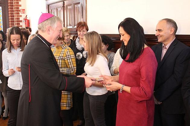 Biskup Kasyna z kolędą w ratuszu